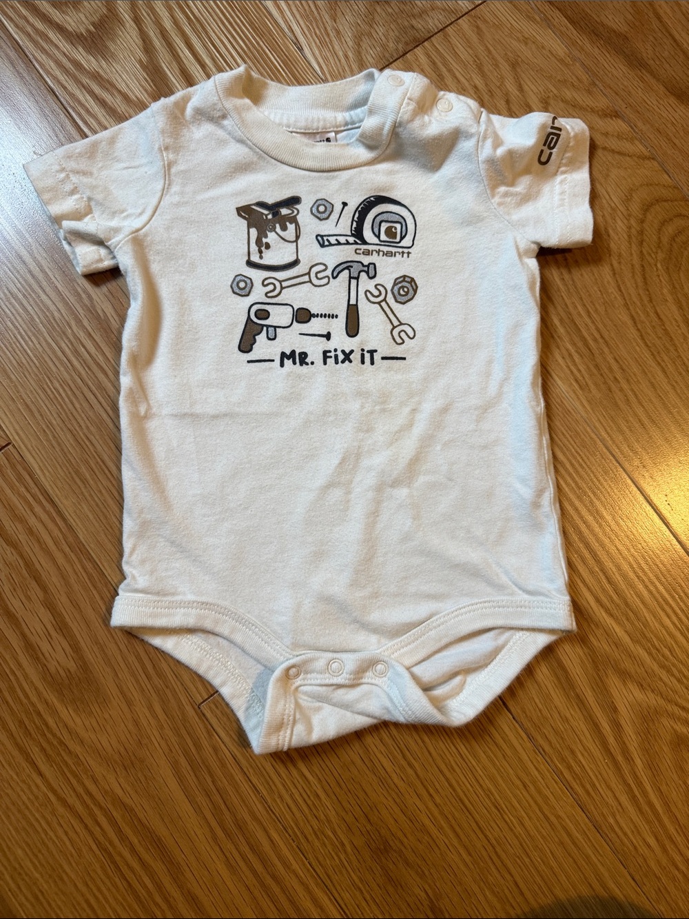 Carhartt Off White Baby Onesie with Tool Graphic